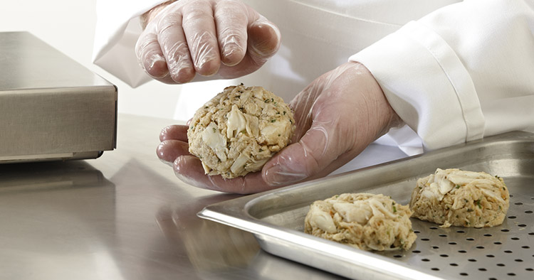 Chef making crab cakes